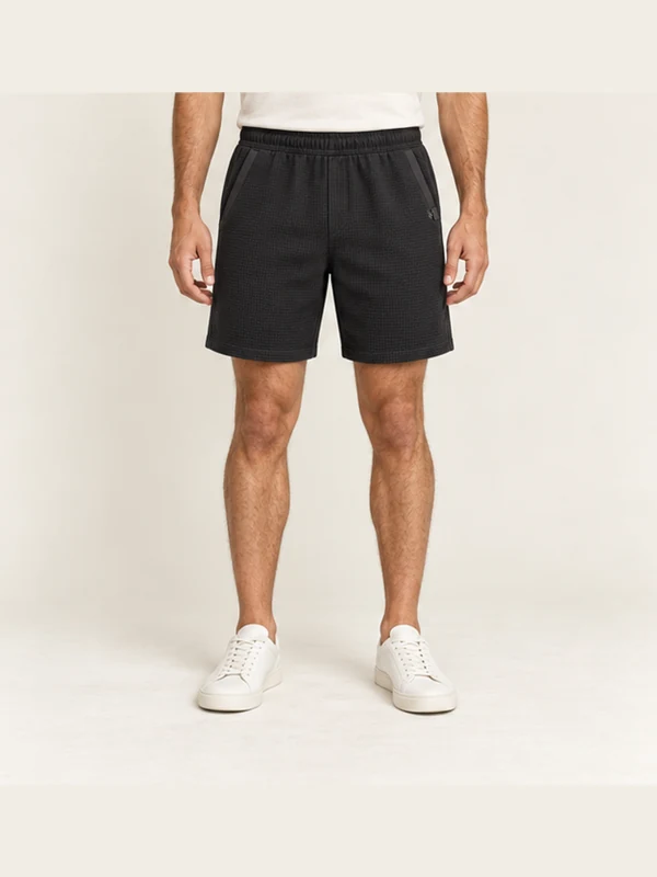 Cinder Texture Shorts — Washed Black, On-model view